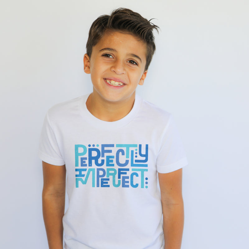 boy wears perfectly imperfect tee in white